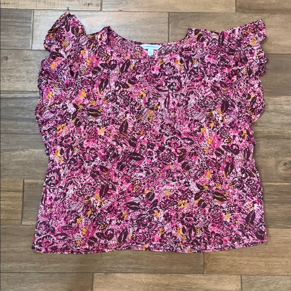 Counterparts Sleeveless Blouse
Size XL ruffled sleeves
